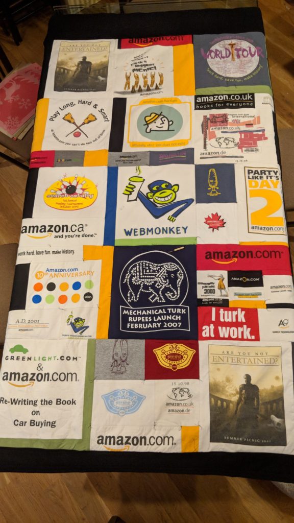 All of Ruben's Amazon t-shirts made into a quilt (1998-2007)